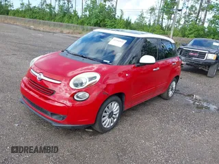 2014 FIAT 500L Easy z VIN ZFBCFABH7EZ001401, wystawiony jako IAAI lot #42244522 z przebiegiem 164 138 mil mil oraz . Historia ofert i sprzedaży dostępna na DreamBid. Obrazek 2.