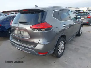 2017 Nissan Rogue SV with VIN KNMAT2MV1HP583081, listed as a IAAI auction lot 42156332 with 105,723 mi miles. Bid and sale history available at carsss.com. Image 4.