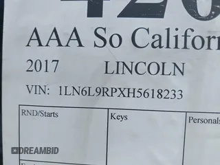 2017 Lincoln Continental Reserve with VIN 1LN6L9RPXH5618233, listed as a IAAI auction lot 42073706 with Not provided miles and . Bid and sale history available at DreamBid. Image 9.
