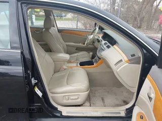 2005 Toyota Avalon XL with VIN 4T1BK36B15U048289, listed as a IAAI auction lot 42094366 with 160,991 mi miles. Bid and sale history available at carsss.com. Image 5.