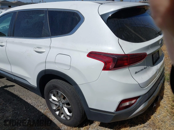 2020 Hyundai Santa Fe SE with VIN 5NMS23AD8LH285363, listed as a IAAI auction lot 42408647 with 60,058 mi miles and . Bid and sale history available at DreamBid. Image 3.