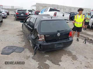2001 Volkswagen Golf z VIN 9BWGS61JX14039374, wystawiony jako IAAI lot #42386963 z przebiegiem 219 265 mil mil oraz . Historia ofert i sprzedaży dostępna na DreamBid. Obrazek 3.