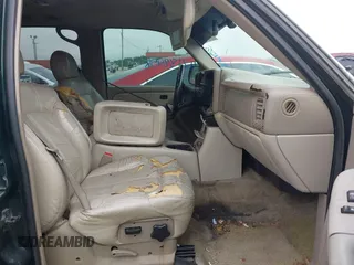 2002 Chevrolet Suburban LT with VIN 1GNEC16ZX2J248205, listed as a IAAI auction lot 42188458 with 343,846 mi miles and . Bid and sale history available at DreamBid. Image 5.
