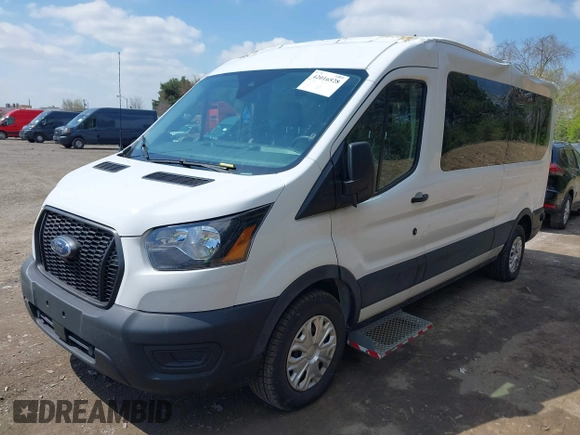 2021 Ford Transit Cargo with VIN 1FTBR1C85MKA66513, listed as a IAAI auction lot 42016528 with 18,174 mi miles and . Bid and sale history available at DreamBid. Image 17.