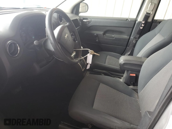 2010 Jeep Compass Sport with VIN 1J4NF4FB6AD521894, listed as a Copart auction lot 46027325 with 149,230 mi miles and Salvage Title. Bid and sale history available at carsss.com. Image 7.