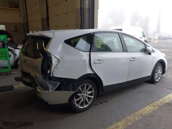 2015 Toyota Prius v Two with VIN JTDZN3EU3FJ030358, listed as a IAAI auction lot 41675153 with 149,482 mi miles. Bid and sale history available at carsss.com. Image 4.