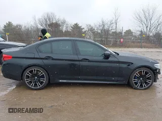 2020 BMW M5 Competition z VIN WBSJF0C00LCD37331, wystawiony jako IAAI lot #41738410 z przebiegiem 49 788 mil mil oraz . Historia ofert i sprzedaży dostępna na DreamBid. Obrazek 13.