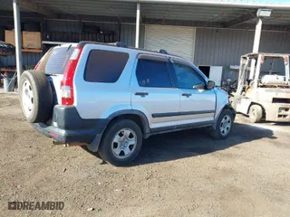 2005 Honda CR-V LX with VIN JHLRD78555C052043, listed as a IAAI auction lot 41156979 with 189,399 mi miles. Bid and sale history available at carsss.com. Image 4.