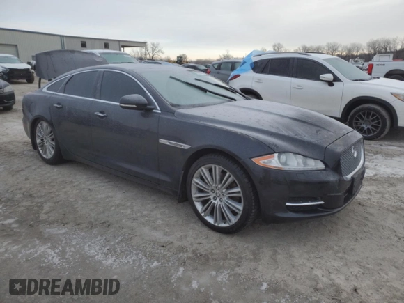 2013 Jaguar XJ with VIN SAJWA1C70D8V41578, listed as a Copart auction lot 89080585 with 76,063 mi miles and Salvage Title. Bid and sale history available at DreamBid. Image 4.
