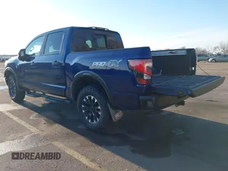 2021 Nissan Titan Pro-4X z VIN 1N6AA1ED1MN517476, wystawiony jako IAAI lot #41422217 z przebiegiem 62 650 mil mil oraz . Historia ofert i sprzedaży dostępna na DreamBid. Obrazek 3.