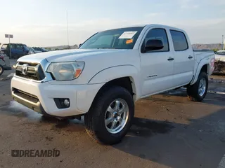 2014 Toyota Tacoma PreRunner with VIN 3TMJU4GN3EM160587, listed as a IAAI auction lot 42710985 with 200,867 mi miles and . Bid and sale history available at DreamBid. Image 2.