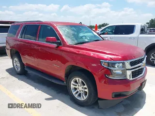 2015 Chevrolet Tahoe LS with VIN 1GNSCAEC4FR121571, listed as a IAAI auction lot 42499156 with 131,284 mi miles and . Bid and sale history available at DreamBid. Image 1.