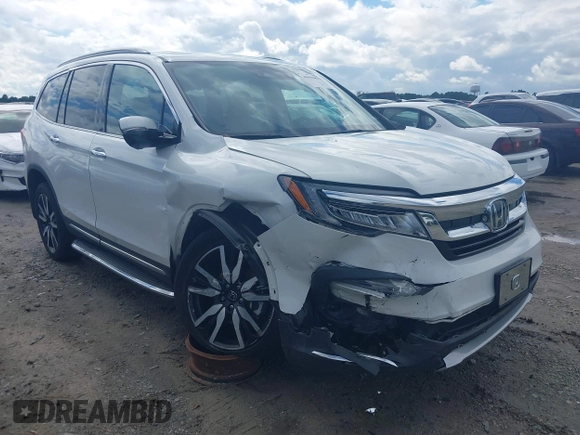 2020 Honda Pilot Elite with VIN 5FNYF6H08LB014288, listed as a IAAI auction lot 40496871 with 57,921 mi miles and . Bid and sale history available at DreamBid. Image 1.