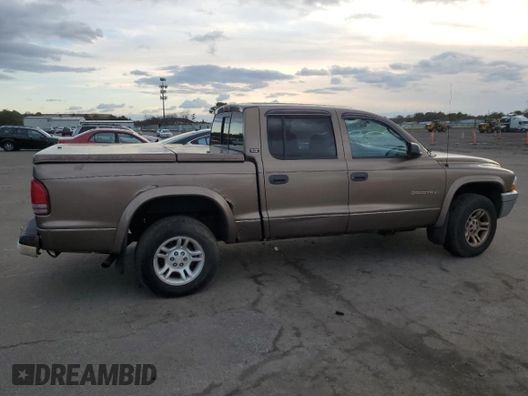 2001 Dodge Dakota z VIN 1B7GG2AX11S108005, wystawiony jako Copart lot #87124934 z przebiegiem 248 482 mil mil oraz Czysty tytuł • Clean title. Historia ofert i sprzedaży dostępna na DreamBid. Obrazek 3.