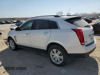 2014 Cadillac SRX with VIN 3GYFNAE32ES667019, listed as a Copart auction lot 49008165 with 98,995 mi miles and Salvage Title. Bid and sale history available at DreamBid. Image 2.