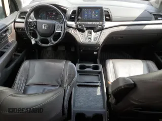 2018 Honda Odyssey EX-L z VIN 5FNRL6H68JB508942, wystawiony jako Copart lot #57323725 z przebiegiem 106 083 mil mil oraz Czysty tytuł • Clean title. Historia ofert i sprzedaży dostępna na DreamBid. Obrazek 8.