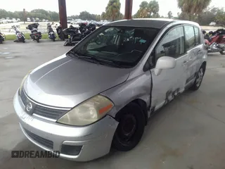2009 Nissan Versa 1.8 SL with VIN 3N1BC13EX9L362594, listed as a IAAI auction lot 37762793 with 254,167 mi miles. Bid and sale history available at carsss.com. Image 2.