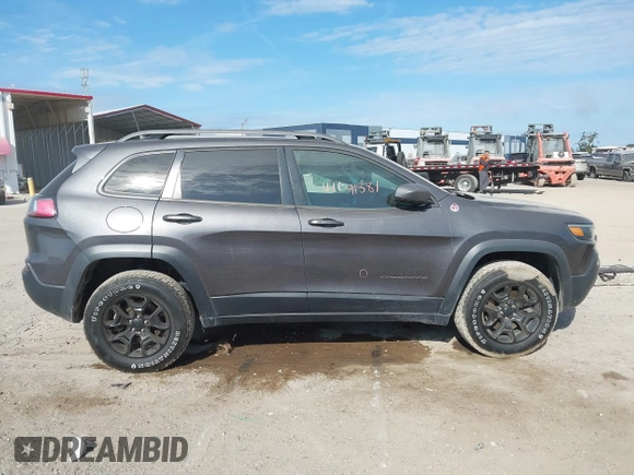 2019 Jeep Cherokee Trailhawk with VIN 1C4PJMBX3KD246100, listed as a IAAI auction lot 41191581 with 98,124 mi miles and . Bid and sale history available at DreamBid. Image 13.