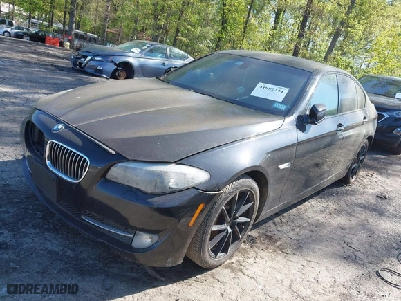 2012 BMW 5 Series 528i with VIN WBAXG5C51CDW85697, listed as a IAAI auction lot 41982244 with 148,744 mi miles. Bid and sale history available at carsss.com. Image 2.
