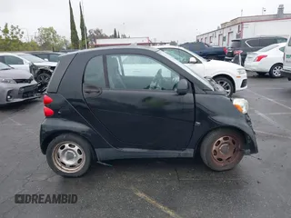 2012 Smart fortwo Pure z VIN WMEEJ3BA9CK521416, wystawiony jako IAAI lot #41847989 z przebiegiem Nie podano mil oraz . Historia ofert i sprzedaży dostępna na DreamBid. Obrazek 14.