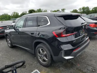 2023 BMW X1 xDrive28i with VIN WBX73EF09P5W64467, listed as a Copart auction lot 58586875 with 29,022 mi miles and Salvage title. Bid and sale history available at DreamBid. Image 2.