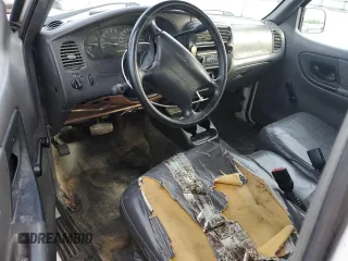 2002 Ford Ranger XL with VIN 1FTYR10DX2TA66722, listed as a Copart auction lot 54425765 with 246,813 mi miles and Non repairable. Bid and sale history available at DreamBid. Image 8.