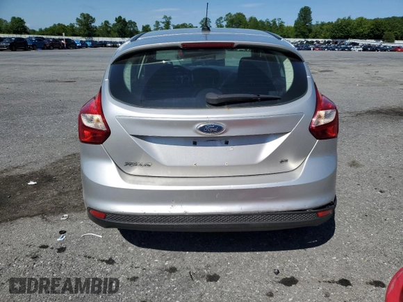 2012 Ford Focus SE z VIN 1FAHP3K20CL219046, wystawiony jako Copart lot #58771285 z przebiegiem 167 703 mil mil oraz Szkoda całkowita • Salvage title. Historia ofert i sprzedaży dostępna na DreamBid. Obrazek 6.