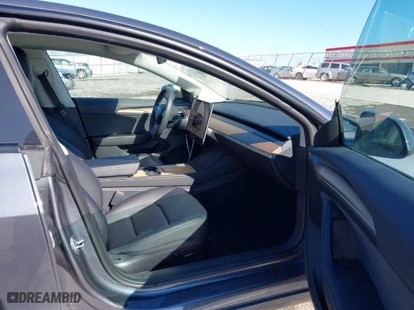 2023 Tesla Model 3 with VIN 5YJ3E1EA0PF485869, listed as a IAAI auction lot 41763996 with 17,092 mi miles. Bid and sale history available at carsss.com. Image 5.