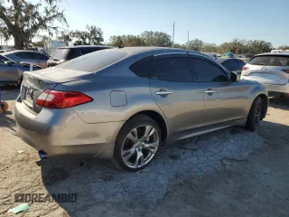 2013 Infiniti M37 with VIN JN1BY1AR9DM604703, listed as a Copart auction lot 77650014 with 104,675 mi miles and Salvage Title. Bid and sale history available at carsss.com. Image 3.