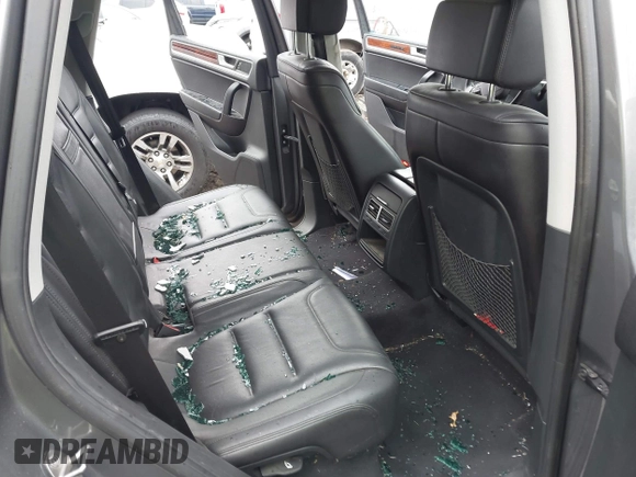 2013 Volkswagen Touareg Lux with VIN WVGEF9BP0DD005082, listed as a IAAI auction lot 41667026 with 140,148 mi miles and . Bid and sale history available at DreamBid. Image 8.