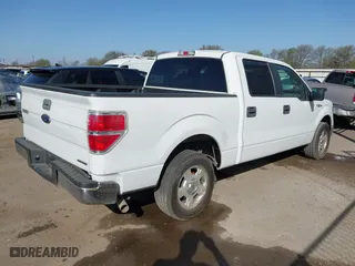 2013 Ford F-150 XL with VIN 1FTFW1CF2DKF73989, listed as a IAAI auction lot 41795990 with 142,387 mi miles. Bid and sale history available at carsss.com. Image 4.