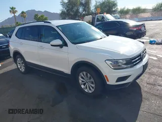 2020 Volkswagen Tiguan S with VIN 3VV1B7AXXLM036994, listed as a IAAI auction lot 42643035 with 62,676 mi miles and . Bid and sale history available at DreamBid. Image 1.