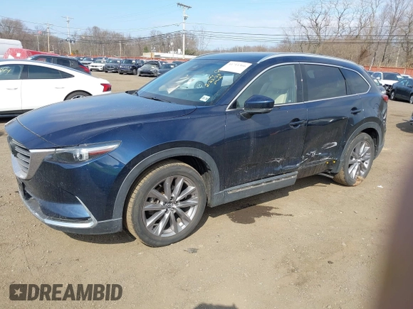2021 Mazda CX-9 Grand Touring with VIN JM3TCBDY7M0540359, listed as a IAAI auction lot 41711366 with 47,391 mi miles and . Bid and sale history available at carsss.com. Image 2.