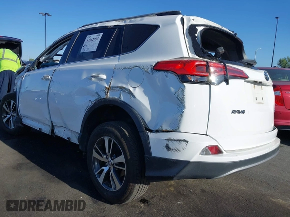 2018 Toyota RAV4 XLE with VIN 2T3WFREV3JW484955, listed as a IAAI auction lot 42262089 with 118,527 mi miles and . Bid and sale history available at DreamBid. Image 3.