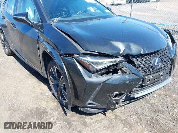 2022 Lexus UX 250h with VIN JTHP9JBH3N2054478, listed as a IAAI auction lot 42060342 with 38,954 mi miles and . Bid and sale history available at DreamBid. Image 6.