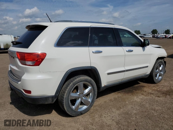 2011 Jeep Grand Cherokee Overland with VIN 1J4RR6GG3BC718723, listed as a Copart auction lot 64975275 with 272,922 mi miles and Salvage title. Bid and sale history available at DreamBid. Image 3.
