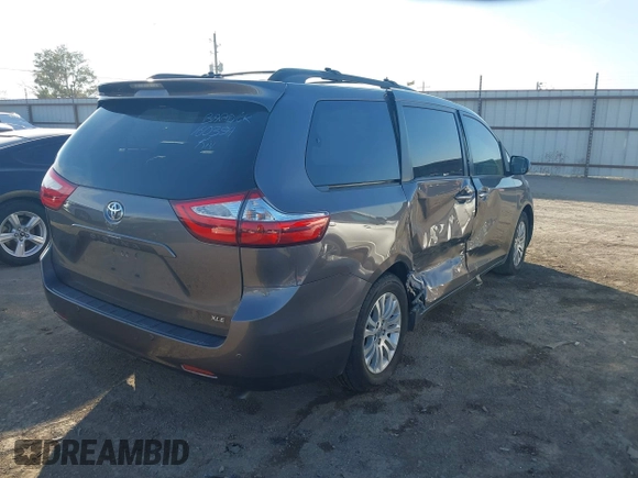 2016 Toyota Sienna XLE with VIN 5TDYK3DC6GS710062, listed as a IAAI auction lot 40953646 with 145,233 mi miles. Bid and sale history available at carsss.com. Image 4.