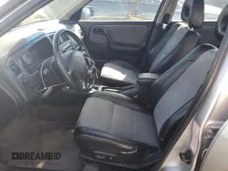 2002 Infiniti G20 Luxury z VIN JNKCP11A42T506808, wystawiony jako Copart lot #75259494 z przebiegiem 69 426 mil mil oraz Szkody całkowita. Historia ofert i sprzedaży dostępna na DreamBid. Obrazek 7.