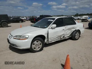 2002 Honda Accord EX with VIN 1HGCG165X2A009482, listed as a Copart auction lot 49660125 with 167,104 mi miles and Salvage title. Bid and sale history available at DreamBid. Image 1.