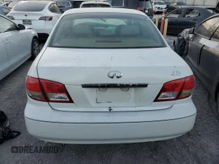 2003 Infiniti I35 Luxury z VIN JNKDA31A13T106515, wystawiony jako Copart lot #71875064 z przebiegiem Nie podano mil oraz Nie do naprawy • Non repairable. Historia ofert i sprzedaży dostępna na DreamBid. Obrazek 6.