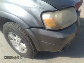 2006 Ford Escape Limited with VIN 1FMYU04126KC42744, listed as a IAAI auction lot 40839433 with 161,429 mi miles and . Bid and sale history available at DreamBid. Image 13.