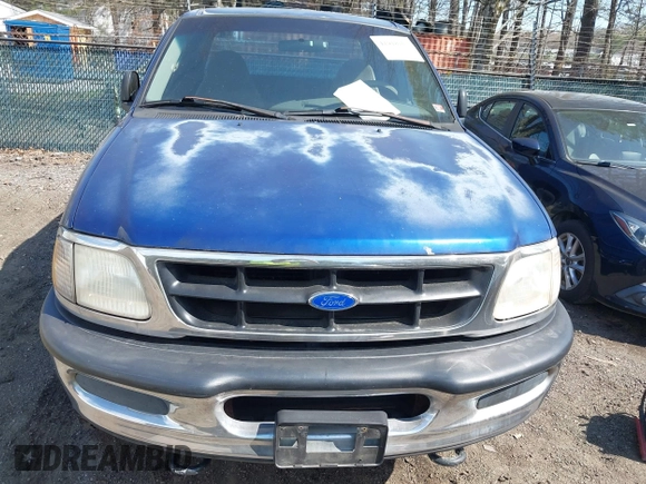 1997 Ford F-150 XL with VIN 1FTDX18W4VNB57679, listed as a IAAI auction lot 41918107 with 132,960 mi miles. Bid and sale history available at carsss.com. Image 6.