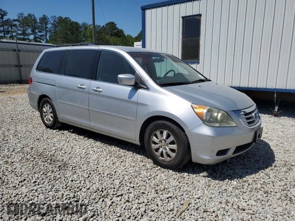 2010 Honda Odyssey EX with VIN 5FNRL3H43AB029325, listed as a Copart auction lot 52177995 with 183,345 mi miles and Salvage Title. Bid and sale history available at DreamBid. Image 4.