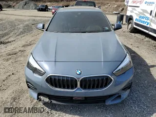 2023 BMW 2 Series 228i xDrive with VIN WBA73AK05P7M55059, listed as a Copart auction lot 49292115 with 14,704 mi miles and Salvage Title. Bid and sale history available at carsss.com. Image 5.
