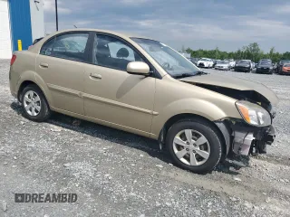 2011 Kia Rio with VIN KNADH4B30B6712241, listed as a Copart auction lot 61301184 with 159,902 mi miles and Salvage Title. Bid and sale history available at DreamBid. Image 4.