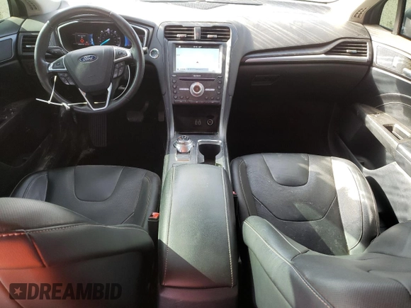2019 Ford Fusion Titanium z VIN 3FA6P0RU5KR217242, wystawiony jako Copart lot #51985955 z przebiegiem 95 220 mil mil oraz Szkoda całkowita • Salvage title. Historia ofert i sprzedaży dostępna na DreamBid. Obrazek 8.