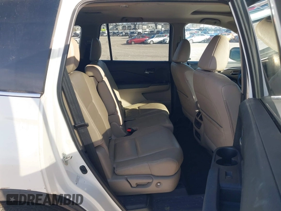 2016 Honda Pilot EX-L with VIN 5FNYF5H5XGB016152, listed as a IAAI auction lot 41820023 with 210,474 mi miles and . Bid and sale history available at DreamBid. Image 8.