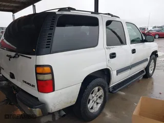 2004 Chevrolet Tahoe LT with VIN 1GNEC13ZX4J131652, listed as a IAAI auction lot 41551921 with 395,802 mi miles. Bid and sale history available at carsss.com. Image 4.