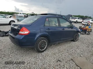 2009 Nissan Versa S with VIN 3N1BC11E19L433572, listed as a Copart auction lot 54084215 with 144,178 mi miles and Salvage title. Bid and sale history available at DreamBid. Image 3.