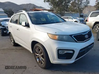 2012 Kia Sorento SX with VIN 5XYKW4A29CG224803, listed as a IAAI auction lot 41493527 with 228,065 mi miles. Bid and sale history available at carsss.com. Image 1.